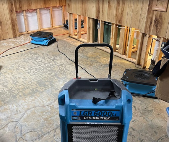 dehumidifiers deployed as part of water damage restoraiton process in Waldorf, Maryland